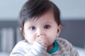how to avoid baby keeping fingers in mouth?