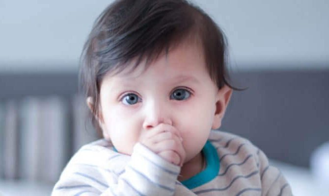 how to avoid baby keeping fingers in mouth?